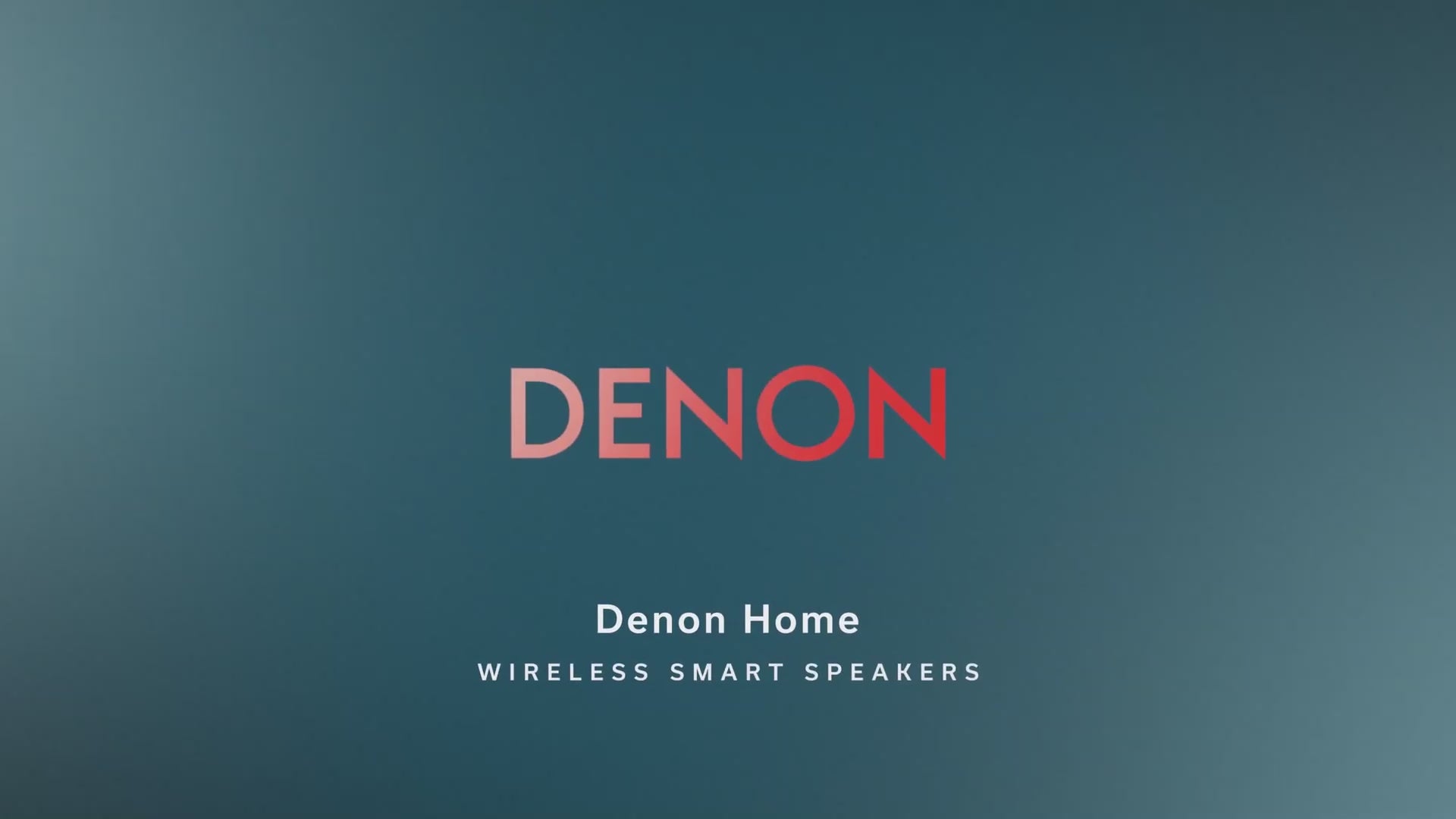 Load video: Predstavitveni video nove serije brezžičnih zvočnikov Denon Home 200, 400 in 600 v modernem interierju. Prikaz modularne zasnove, Dolby Atmos tehnologije z up-firing zvočniki in HEOS multi-room povezljivosti za vrhunski domači avdio sistem.